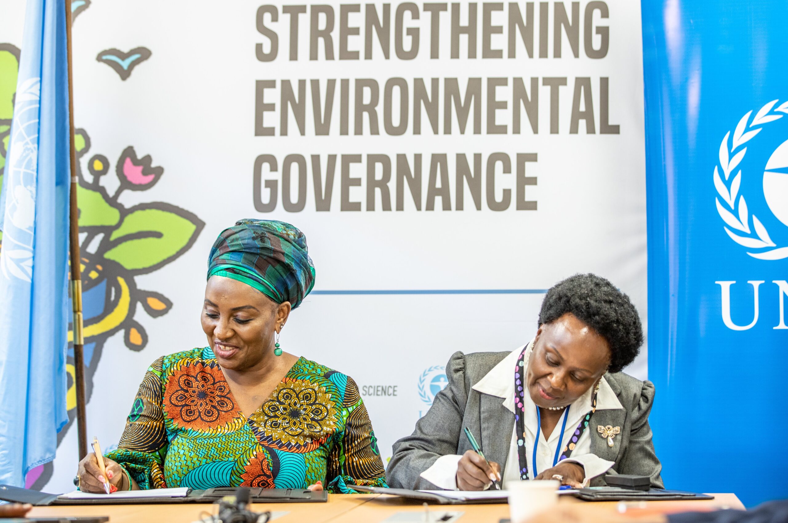 Dr Sheila Ochugboju and Prof Patricia Kameri-Mbote signing the MoU in Nairobi.